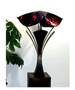Hand rolled glass and wrought iron lamp